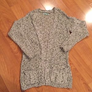 White Cardigan with Black and Silver Specs